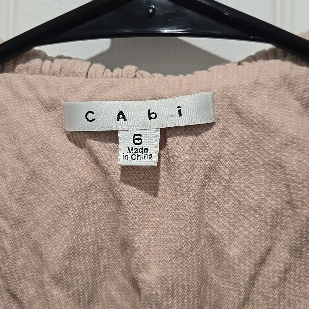 CAbi light peach three-quarters sleeve, front pockets, button down, blazer size6